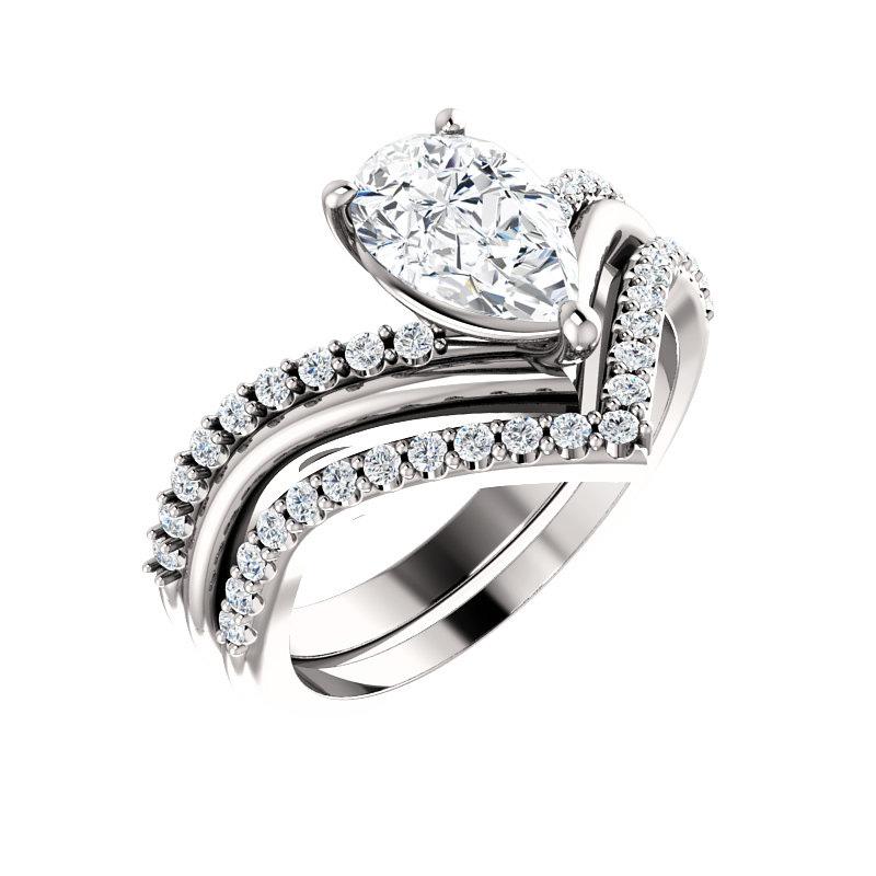 The Nelda Moissanite pear moissanite engagement ring solitaire setting white gold with matching band
